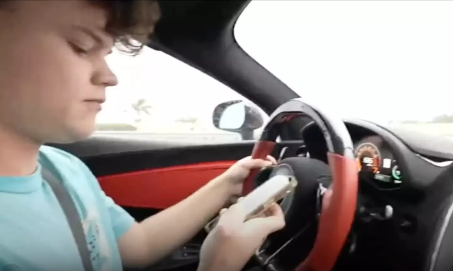 The YouTuber was seemingly distracted by his phone moments before the crash (KICK/jackdoherty)