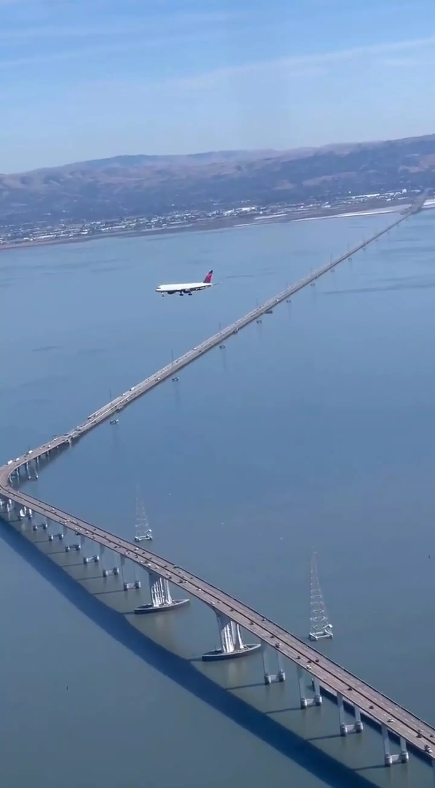 The airplane looks to be frozen in mid-air.