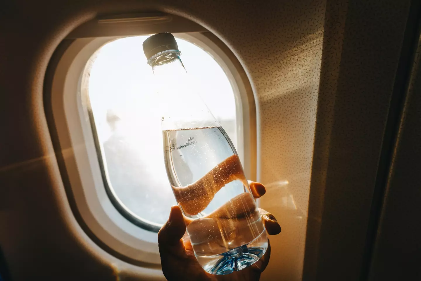 Flight attendants asked passengers to pee into bottles as an alternative (Getty Stock)