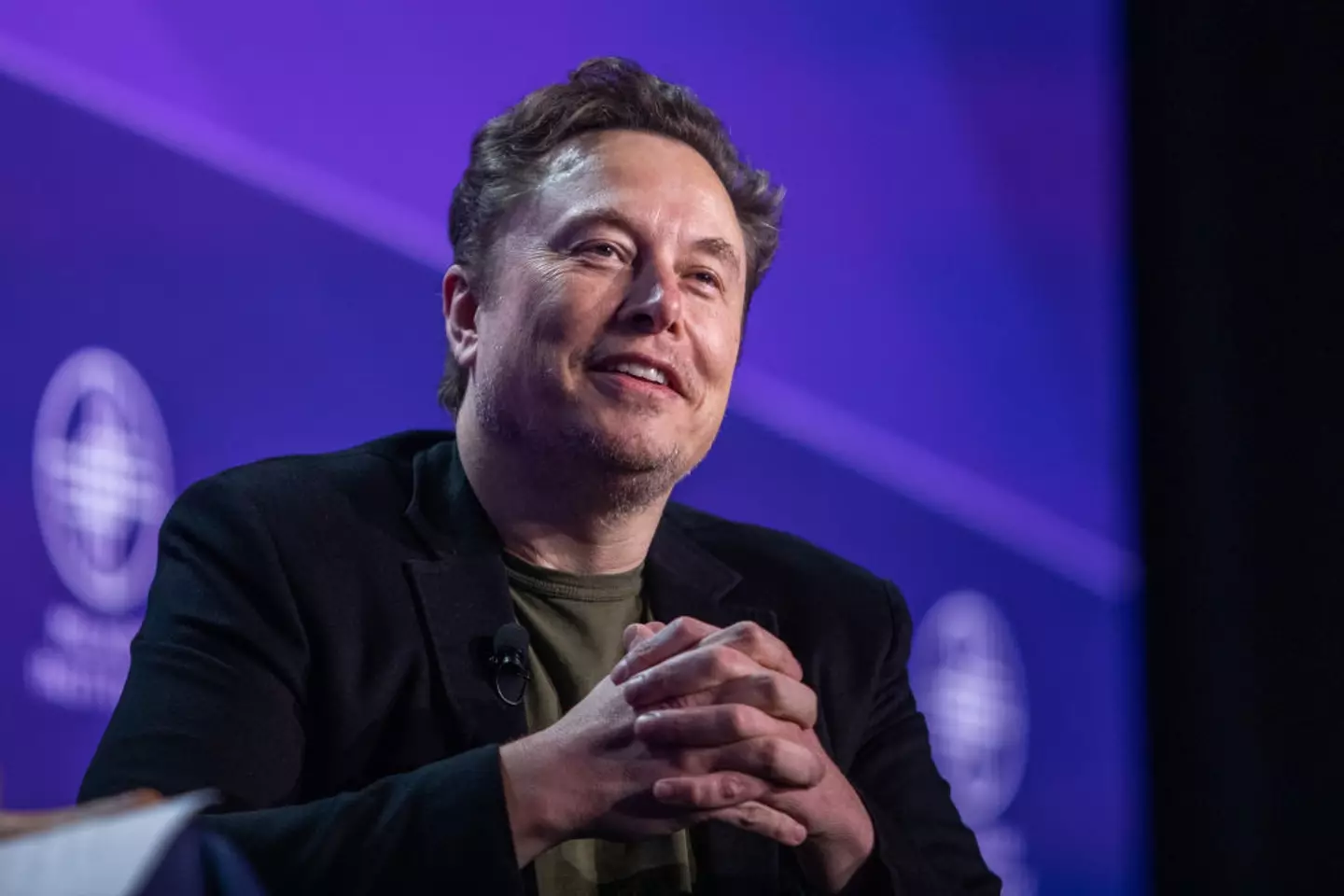 Musk has more money than the third and fourth richest people combined (Apu Gomes/Getty Images)