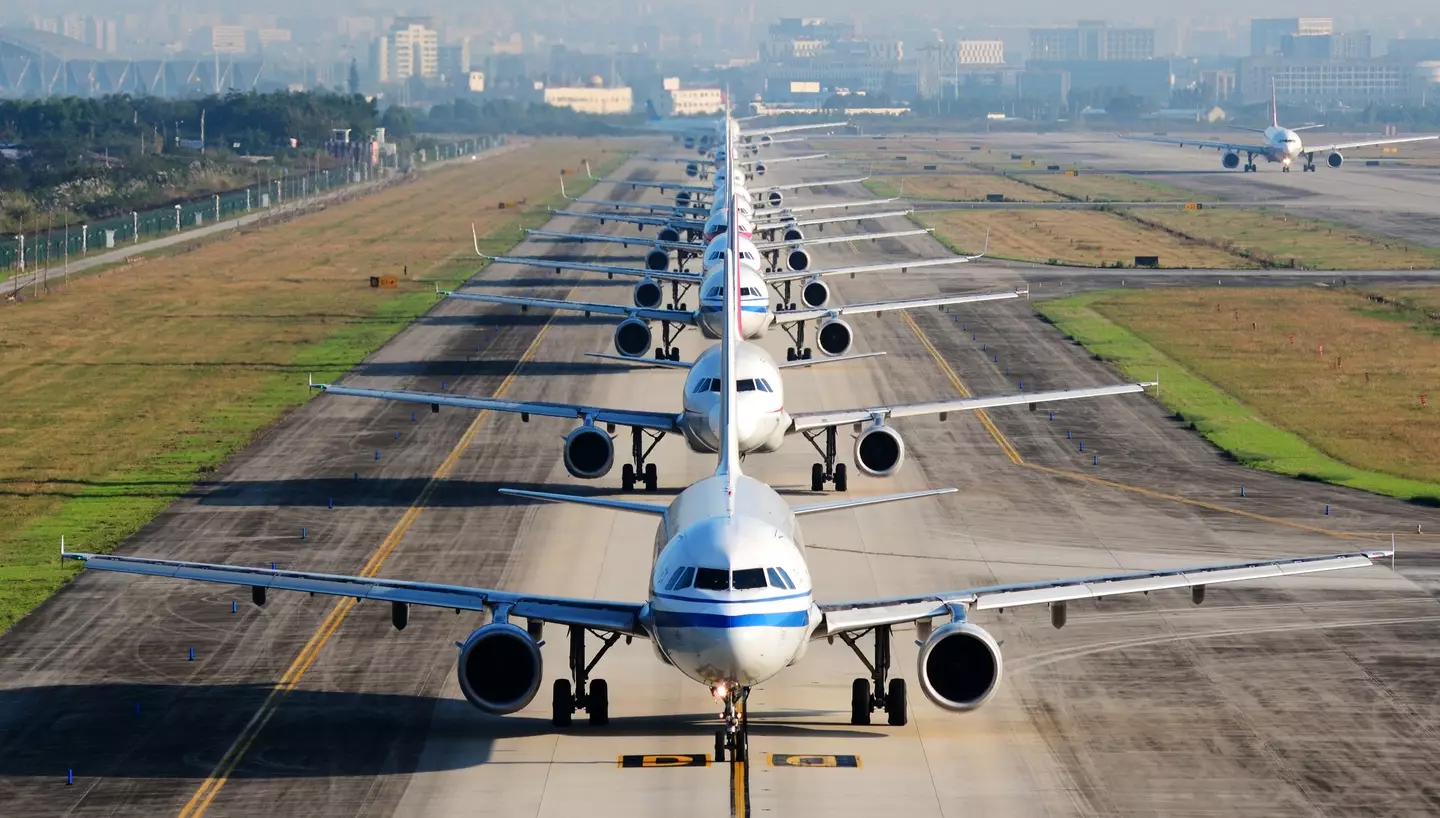 One issue can cause a domino effect on grounded planes. (Jingying Zhao / Getty)