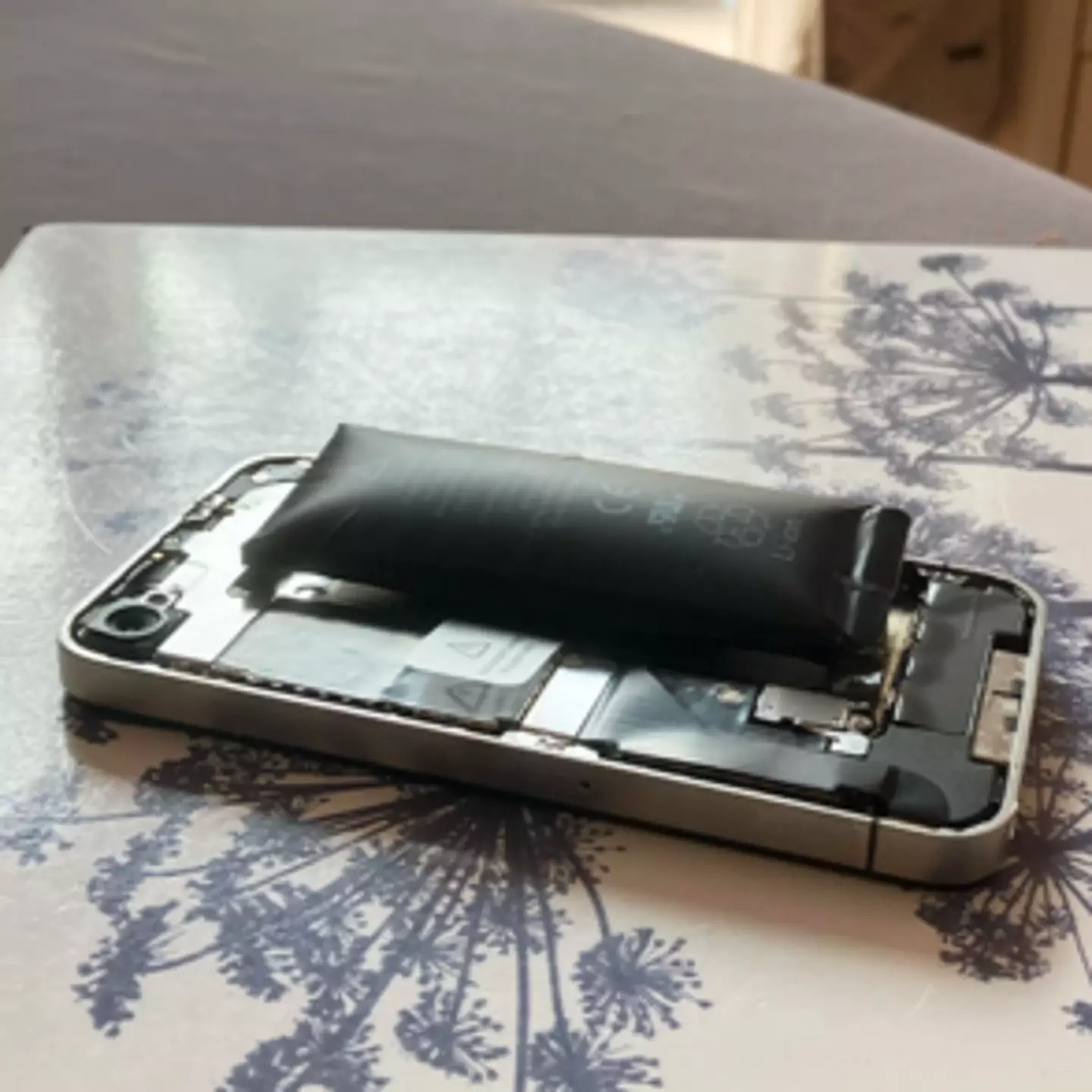 iPhone user warns Apple fans after finding old device with largely swollen battery