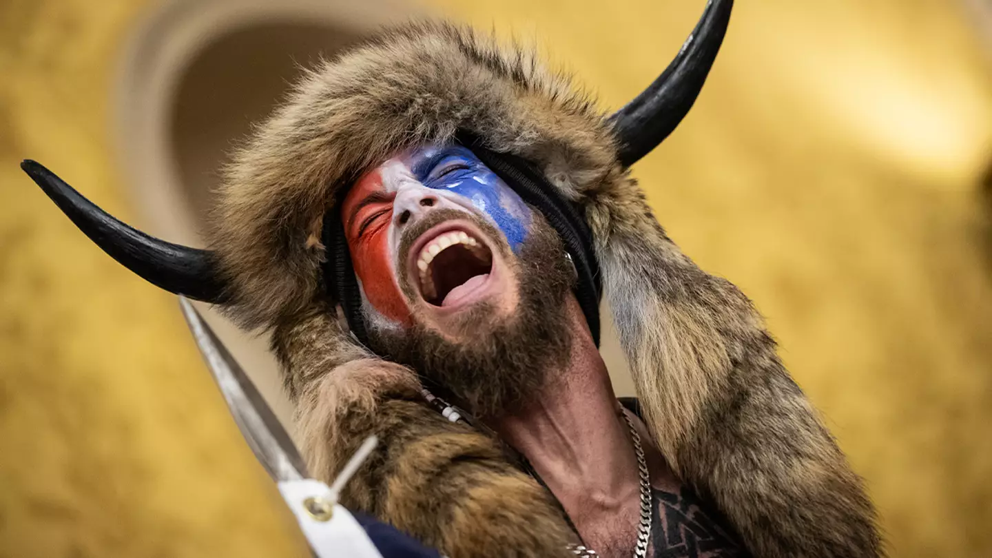 Chansley was a prominent supporter of Q-Anon before his arrest and conviction (Win McNamee / Staff via Getty)