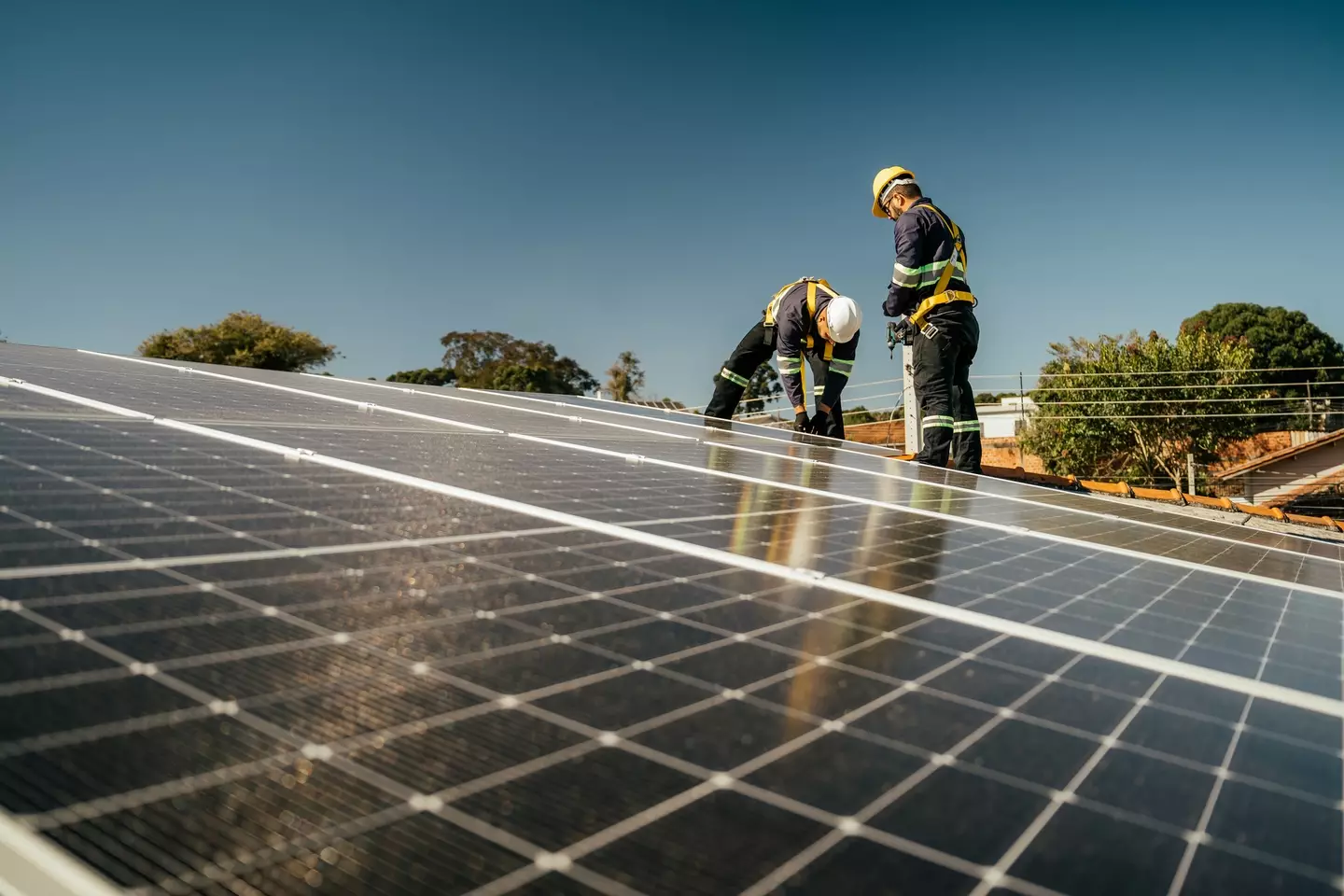 Solar panels connect to the electricity grid through a system called net metering. (Drs Producoes/Getty)