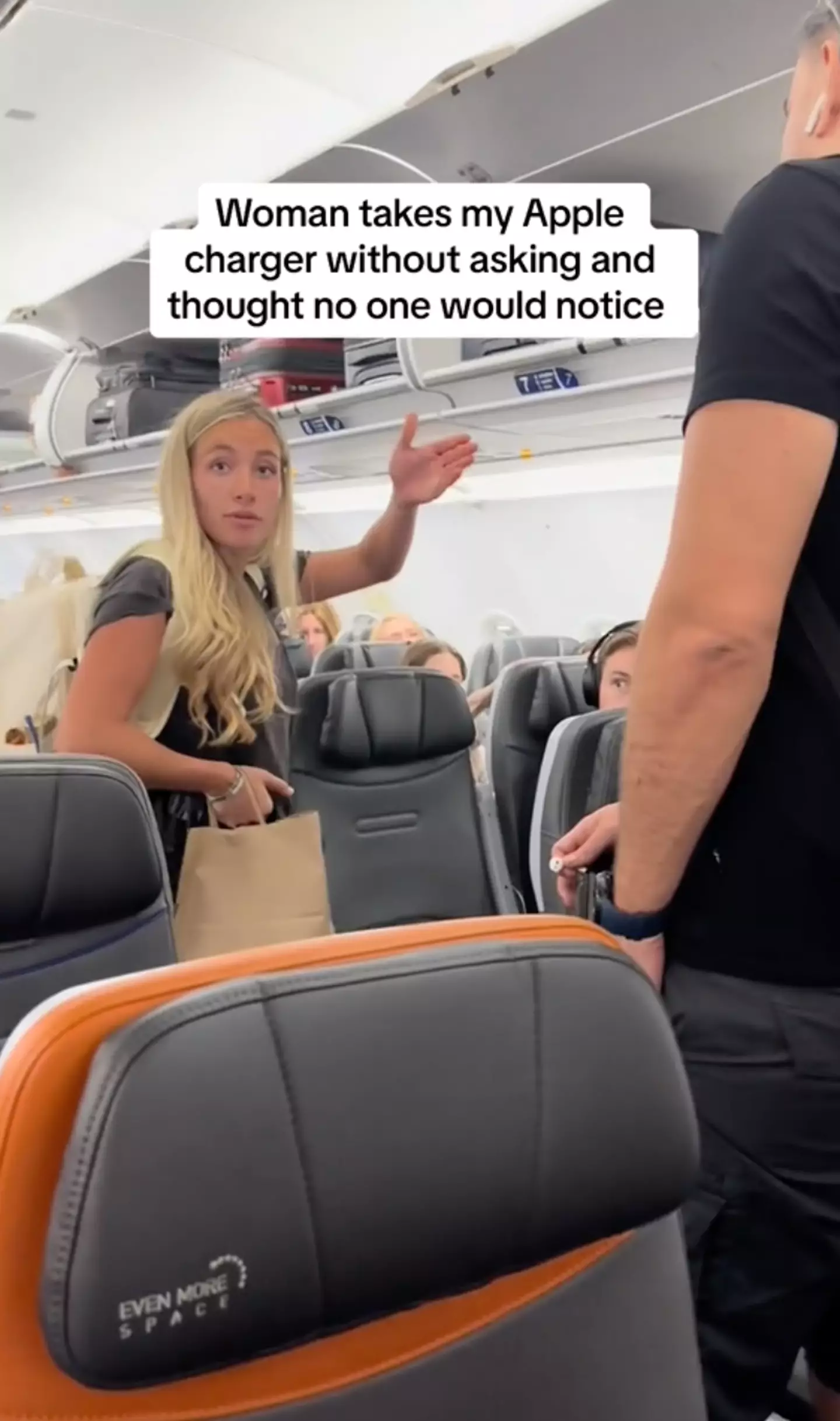 A woman was recently confronted after stealing another passenger's phone charger on a flight (TikTok/rcrelated1)