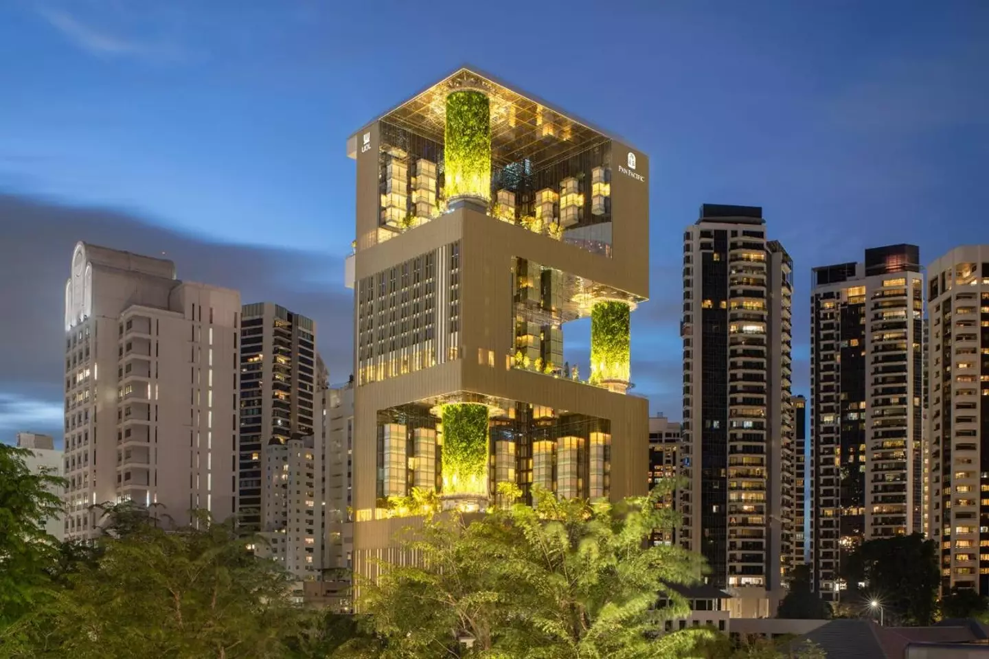 The skyscraper is half jungle and half hotel (Pan Pacific Orchard)