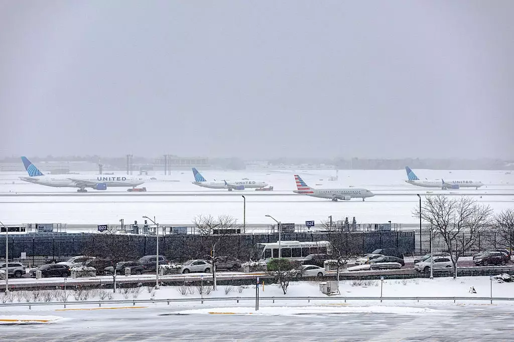 The extreme weather has prompted the FAA to issue ground delays, bringing major airports to a halt (Jim Vondruska/Getty Images)