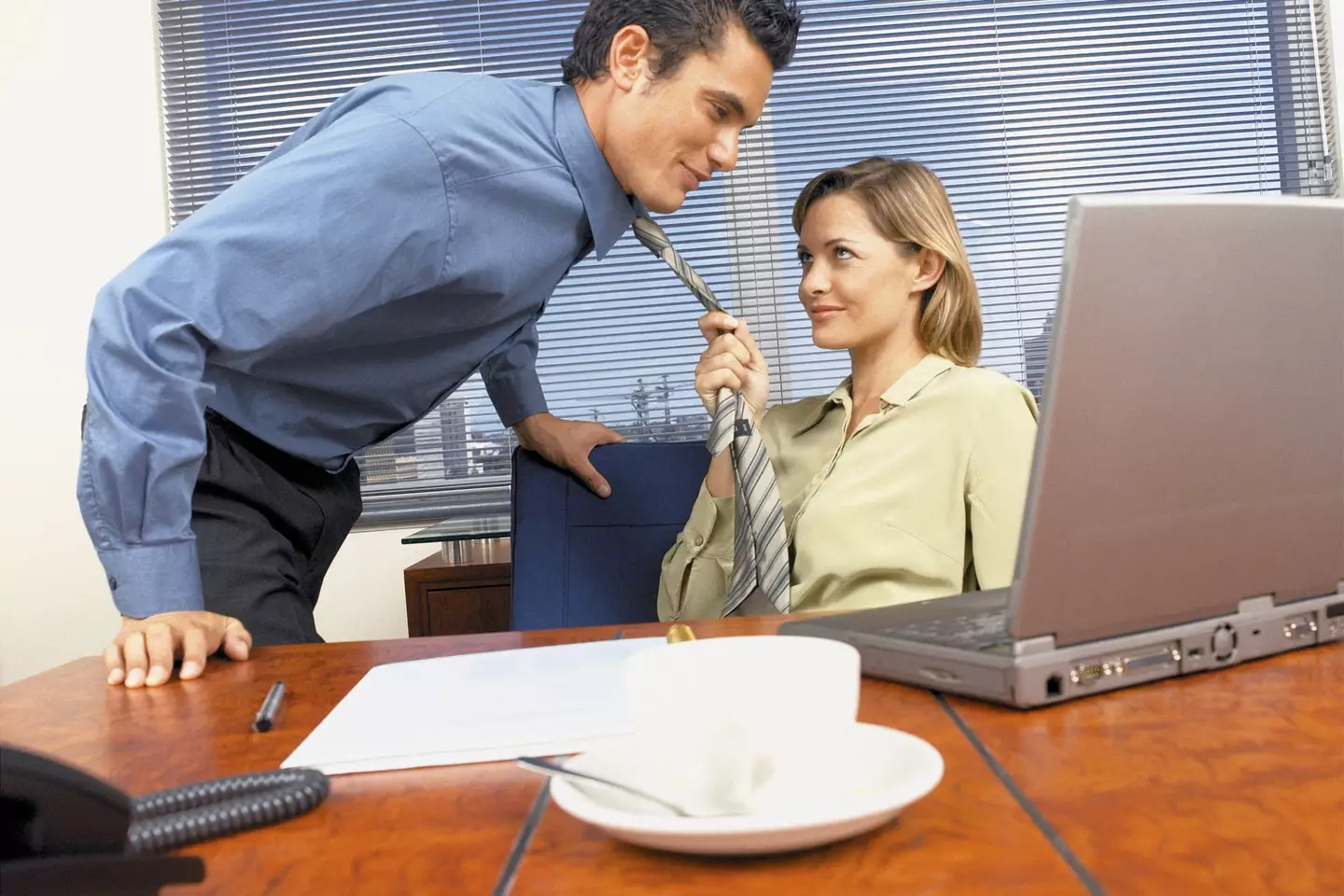 An alarming number of office workers are set to cheat at Christmas (Connect Images / Getty)