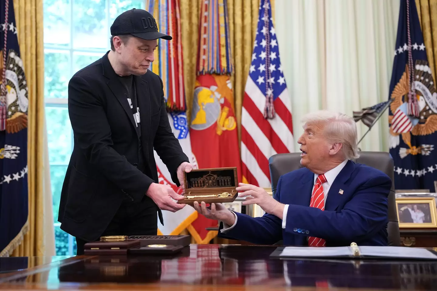 Trump presented Elon Musk with a gold-plated key (Kevin Dietsch/Getty Images)
