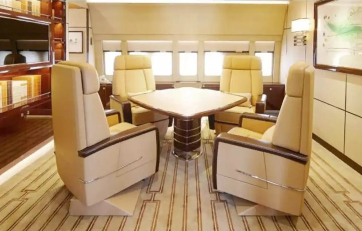 The jet's prestigious conference room with four recliner seats.
