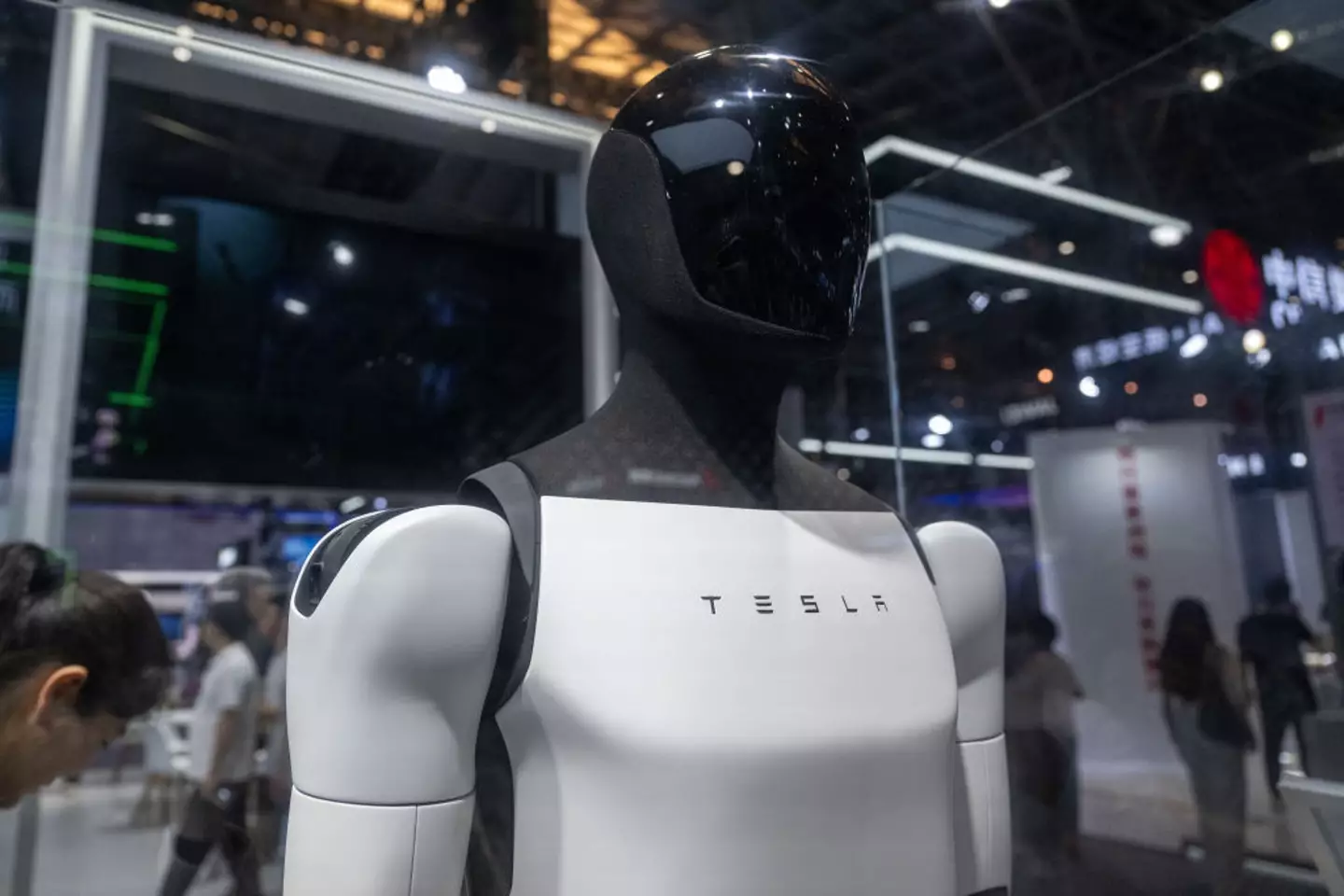 Could Tesla's Optimus robots provide the future that Musk predicts to be so close? (John Ricky/Anadolu via Getty Images)