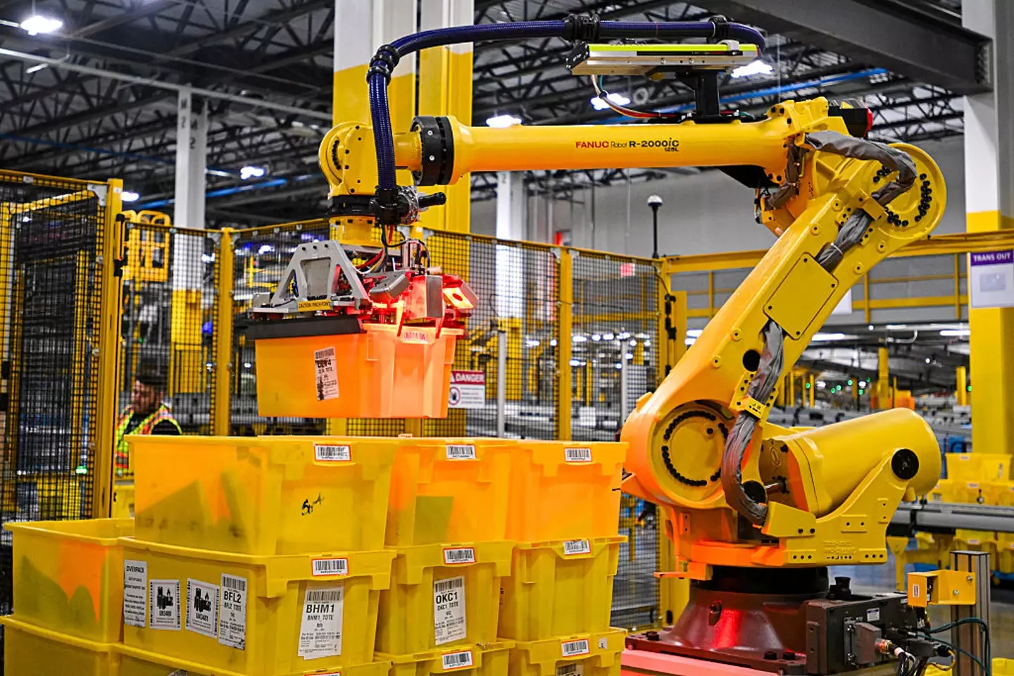 Half a million Amazon employees could be on the ‘cusp’ of losing their jobs to robots (Miguel J. Rodriguez Carrillo/Bloomberg via Getty Images)
