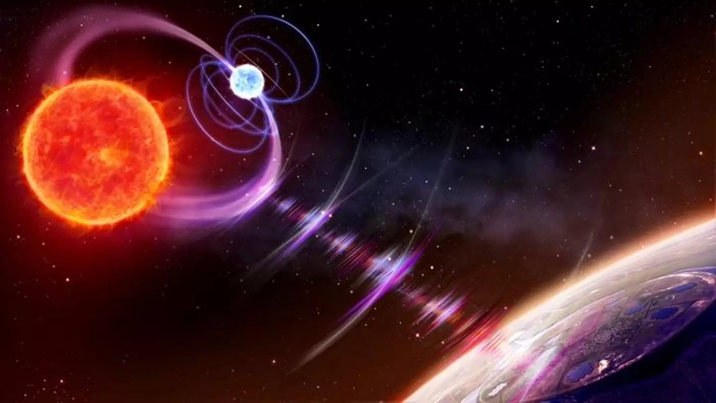 The orbiting red and white dwarfs produce the regular radio blasts when they bash into each other (Daniëlle Futselaar/artsource.nl)