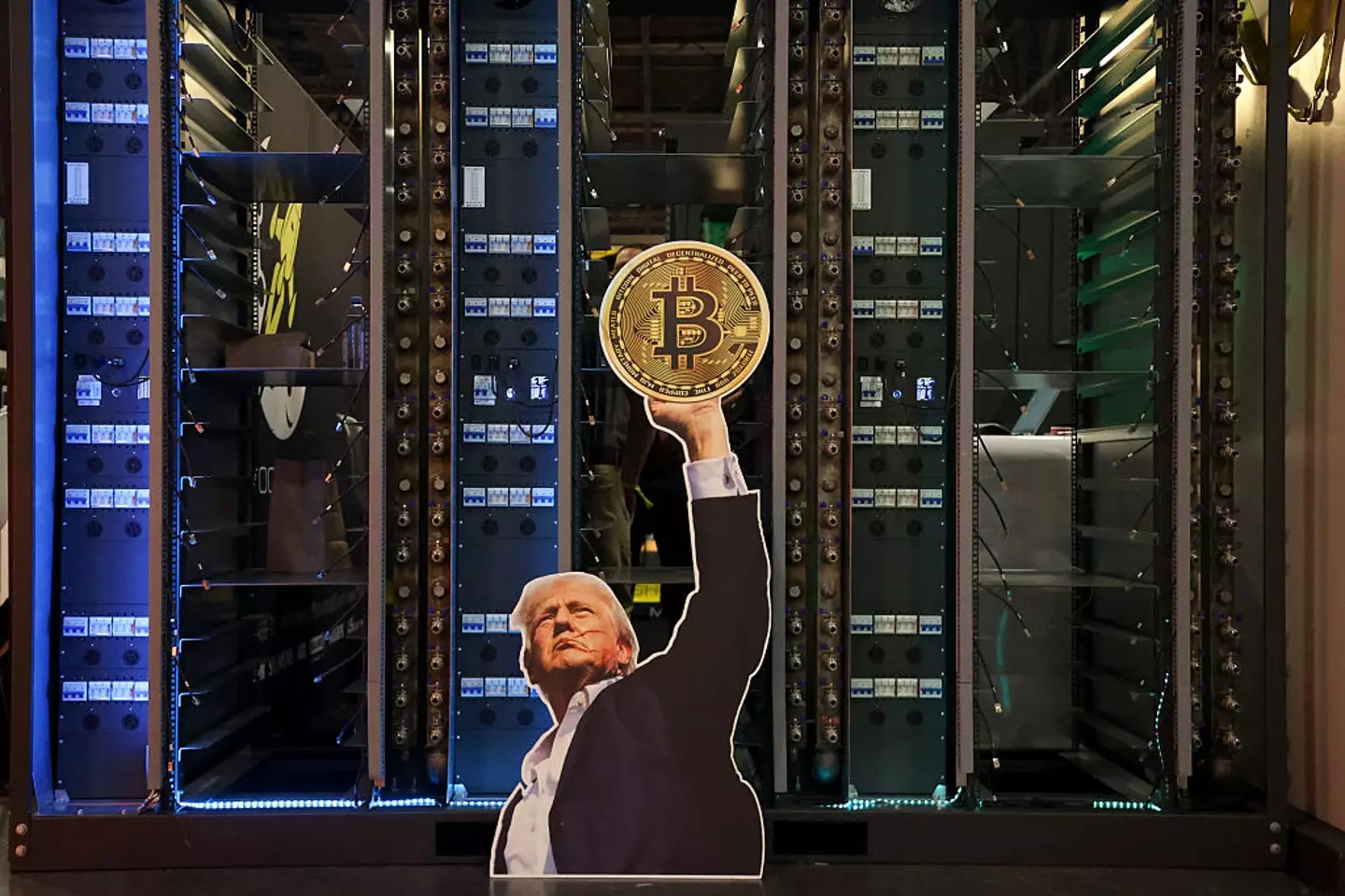 A cutout of US President Donald Trump holding a Bitcoin (IAN MAULE/AFP/Getty Images)