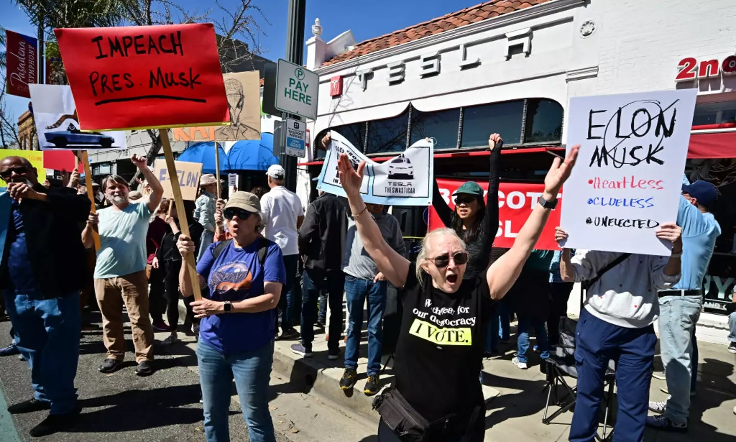 Tesla Takedown insist that they only support peaceful protest and condone violence or destruction of property (Frederic J. Brown/AFP via Getty Images)