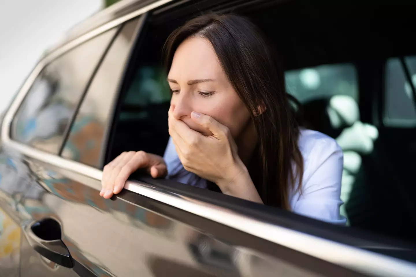 Around one in every three people suffer from motion sickness, and it crops up most when in a car (Getty Stock)