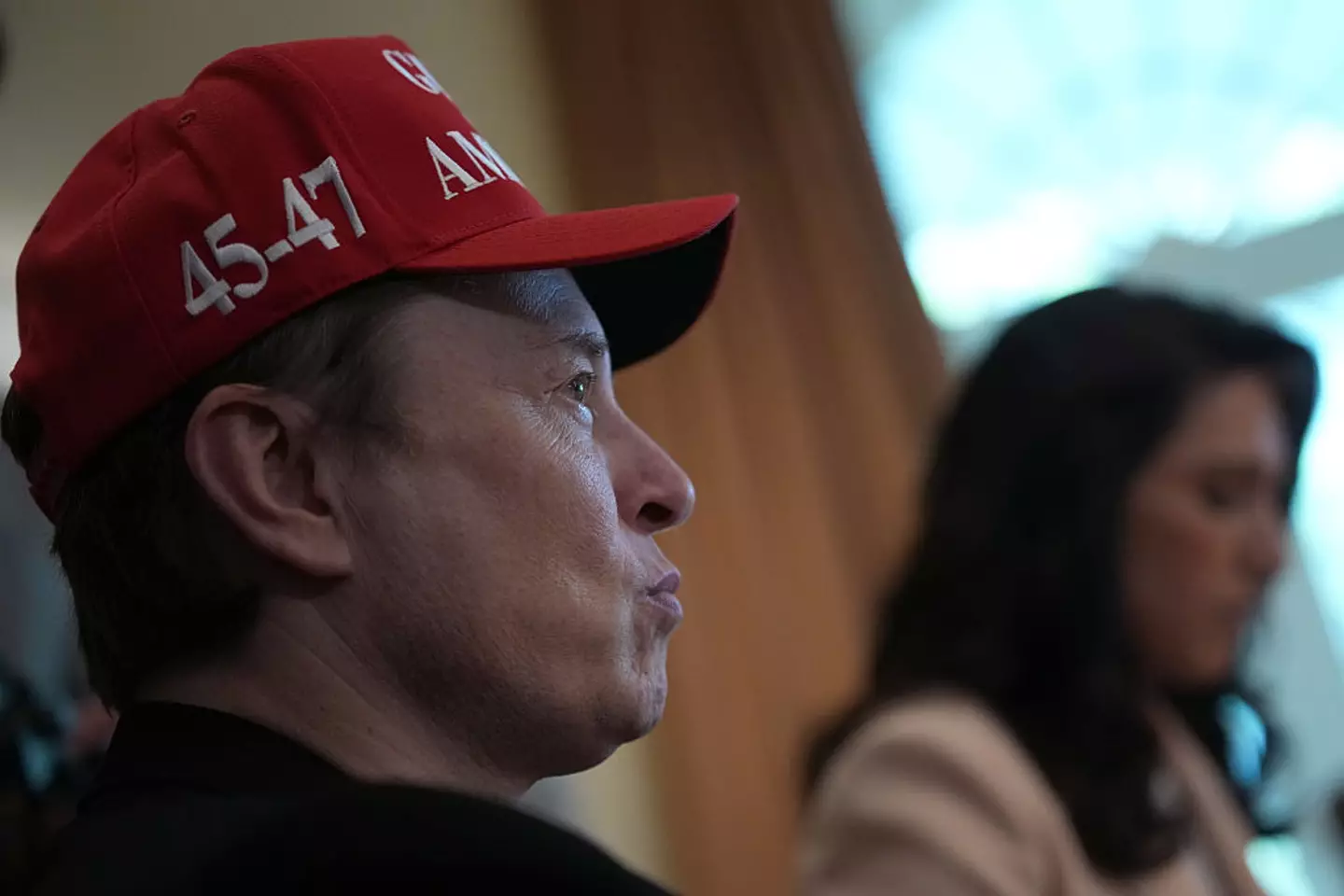 Investors argue Musk is more focused on his political agenda than running his companies. (Andrew Harnik/Staff/Getty)
