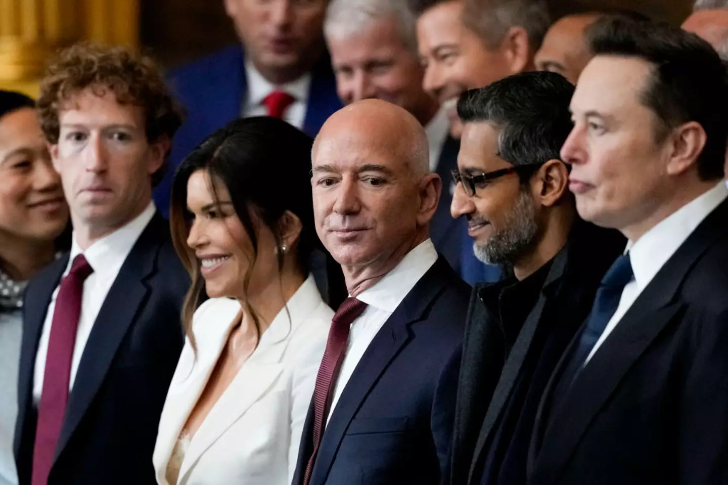 Jeff Bezos standing with Mark Zuckerberg & Elon Musk at Donald Trump's inauguration (Bloomberg / Contributor / Getty)