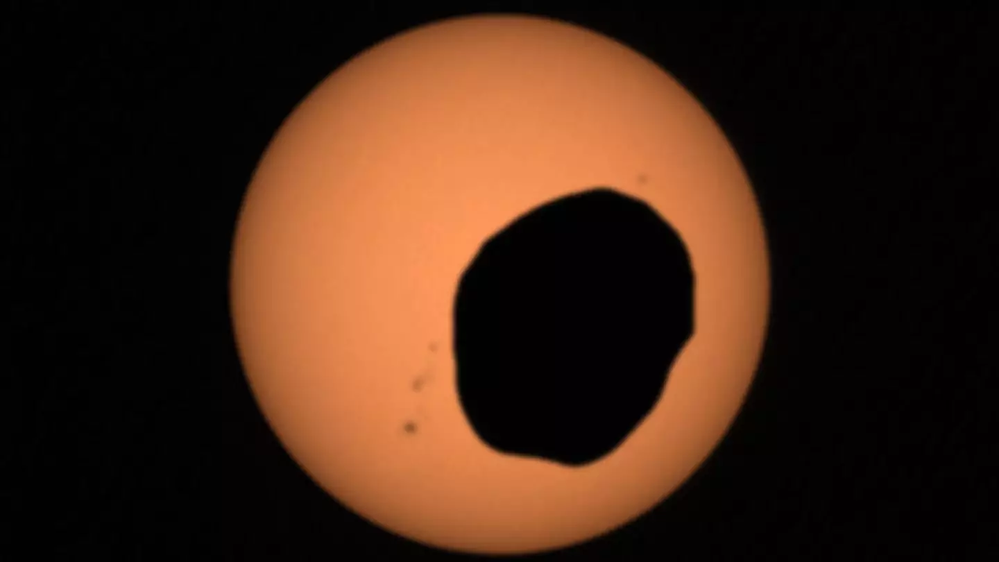 Footage from NASA shows what an eclipse looks like from Mars.