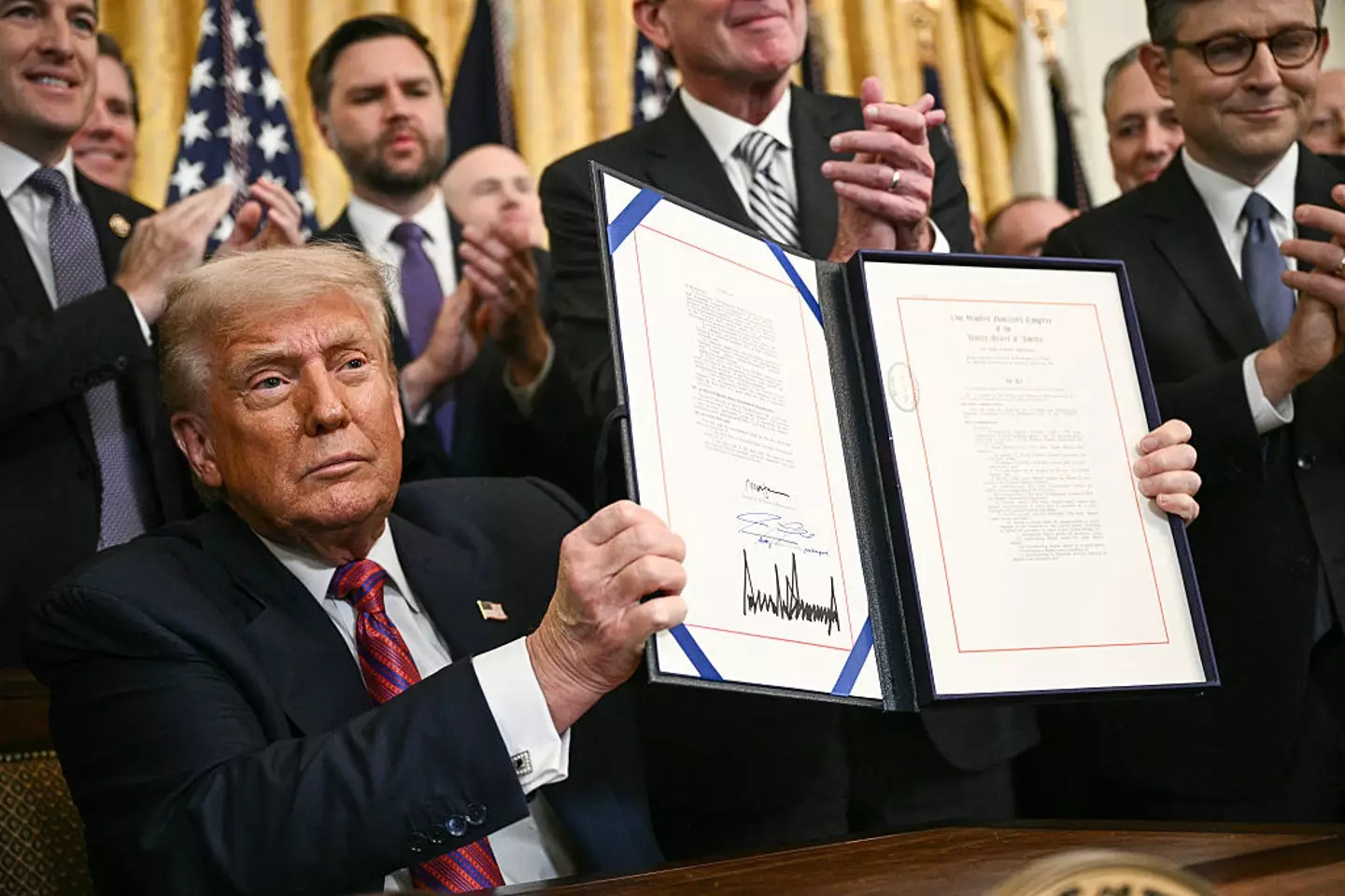 The GENIUS Act has codified the use of stablecoins, which are regulated forms of cryptocurrency pegged to the US dollar (Brendan Smialowski/AFP via Getty Images)