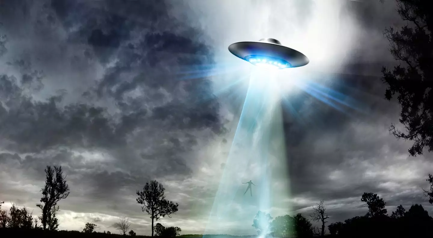 UFO beaming up a man (Getty Images)