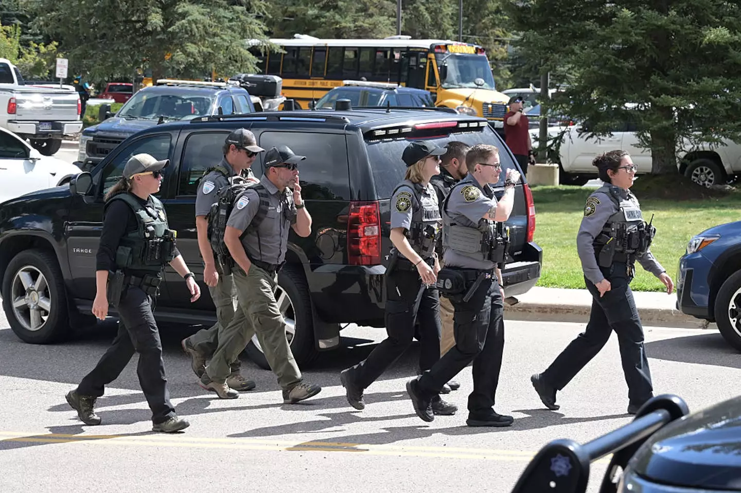 The harrowing clip captures the moment a group of children run past a home while fleeing the shooter (Hyoung Chang/The Denver Post/Getty Images)
