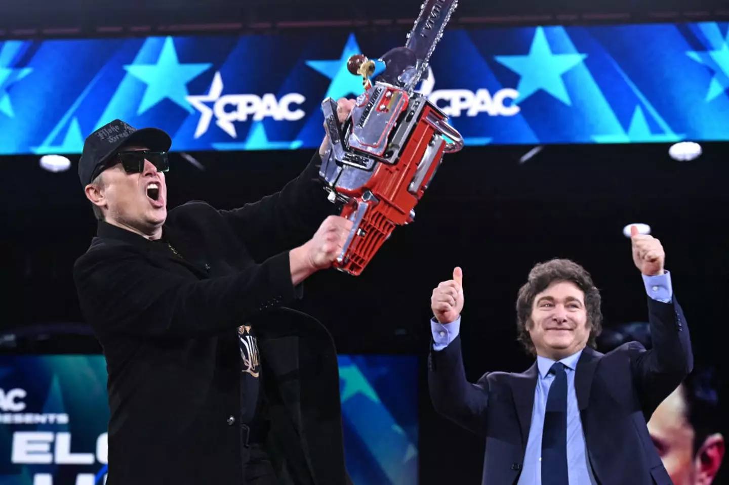 Musk's chainsaw-swinging antics at the CPAC inspired Myers' impersonation (Saul Loeb/AFP via Getty Images)
