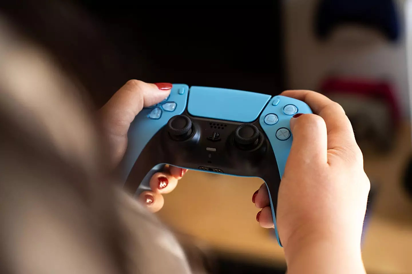 Connecting your DualSense controller to other devices causes a frustrating issue when using your PS5 (Nikos Pekiaridis/NurPhoto via Getty Images)