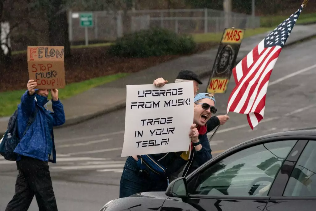 There's a continued backlash to Musk and his new position in the government (David Ryder / Stringer / Getty)