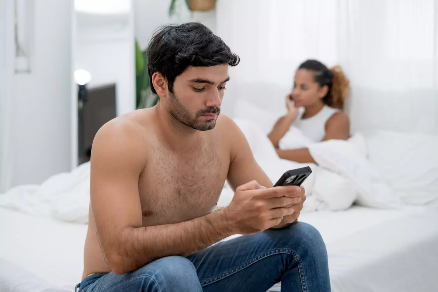 Unfaithful partners might be hiding their affairs with secret codes. (thianchai sitthikongsak/Getty)
