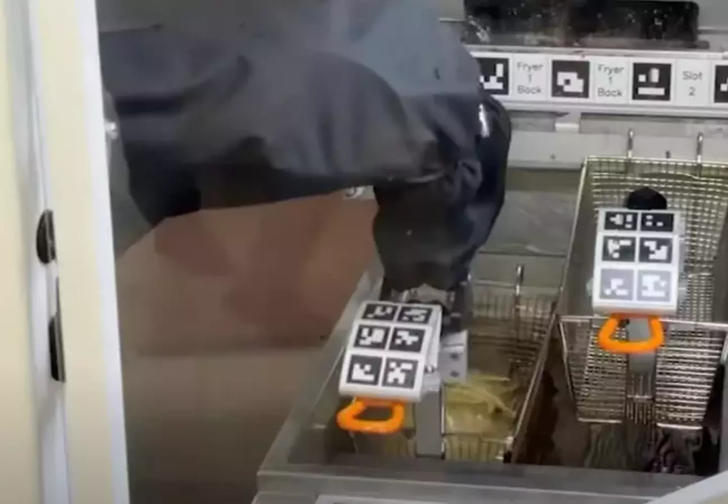 Miso's robotic arm controls the fryers.