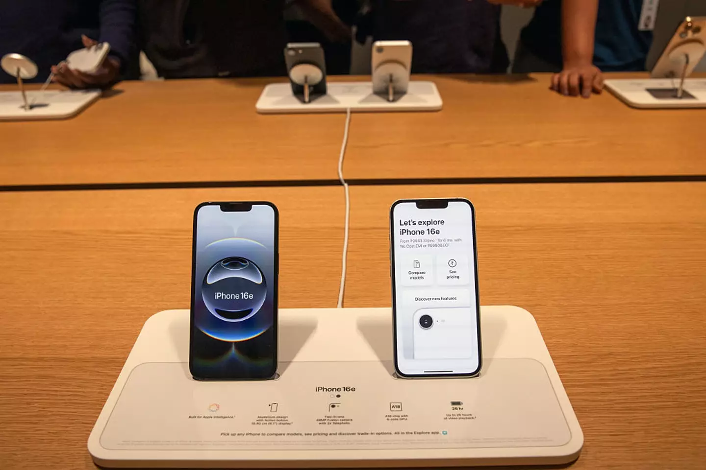 The iPhone 16e became the most affordable iPhone to offer Apple Intelligence features. (Bloomberg/Contributor/Getty)