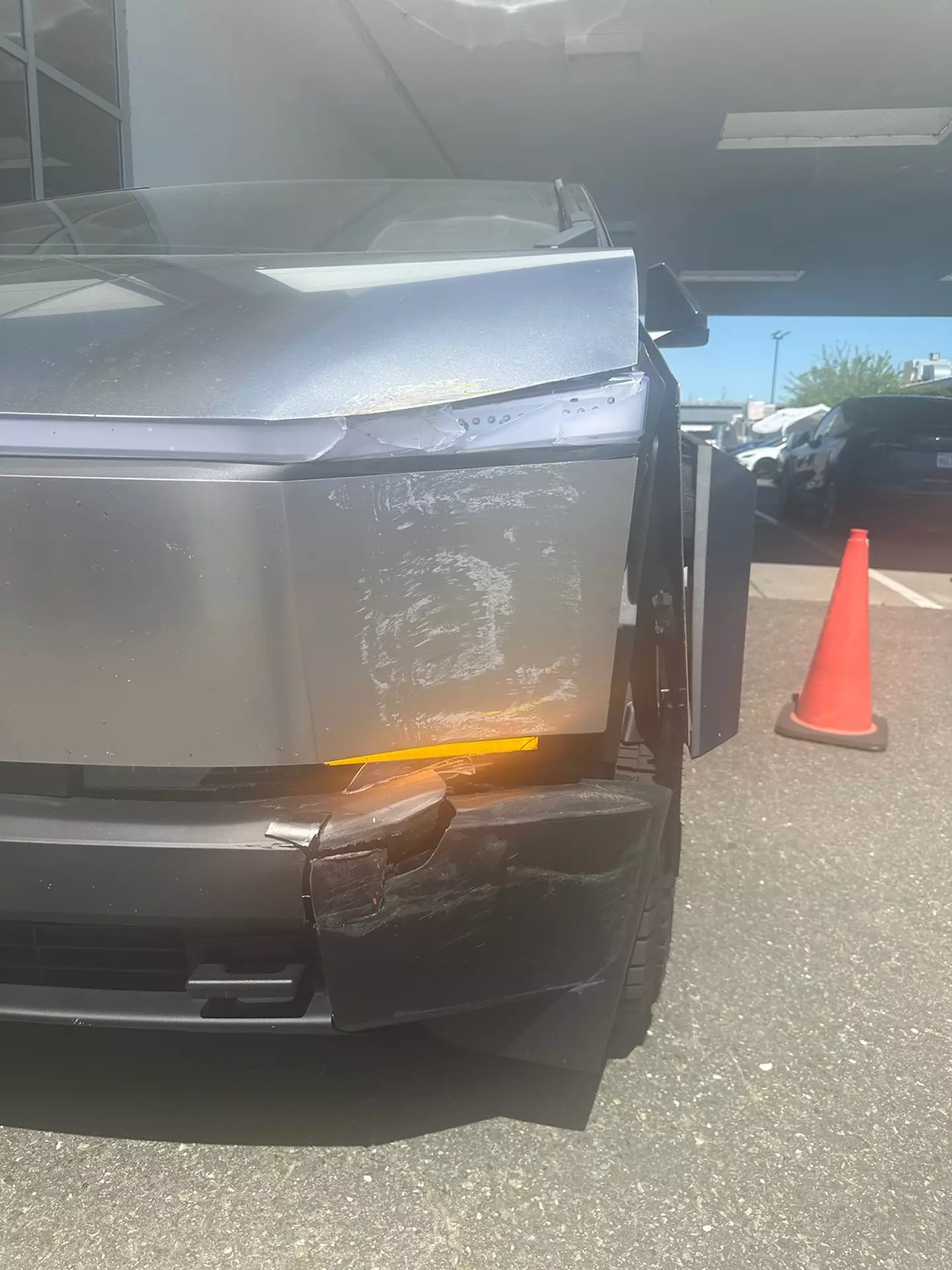A post on a Cybertruck forum shows alleged damage.