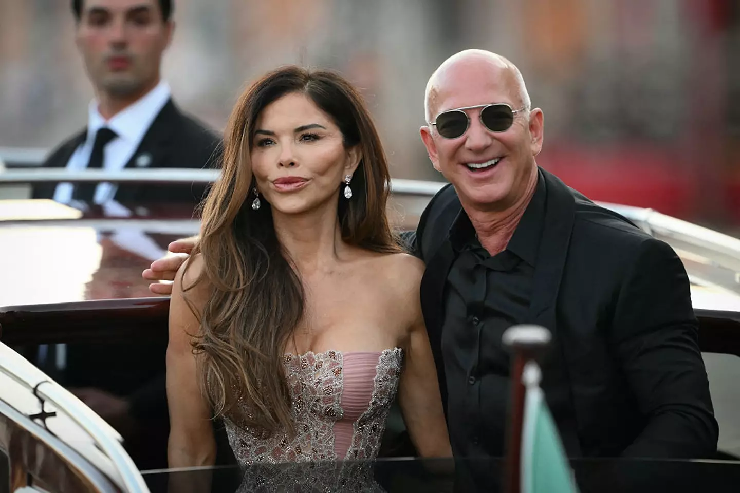 Bezos is seemingly determined to give his wife a starring role in the next Bond film (Marco Bertorello/AFP via Getty Images)