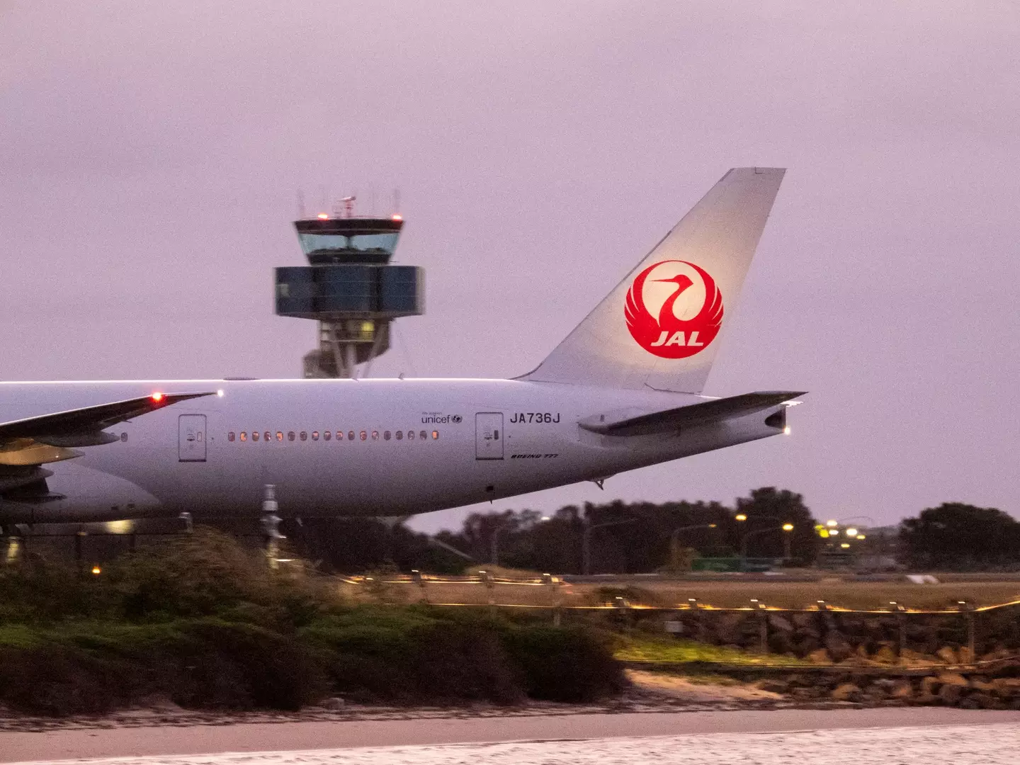 The child climbed into the wheel compartment of a Japan Airlines plane bound for Tokyo. (SCM Jeans/Getty)
