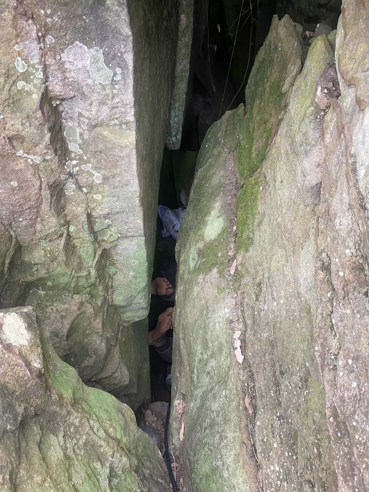The woman was trapped upside down under a rock (Facebook/NSWAmbulance)