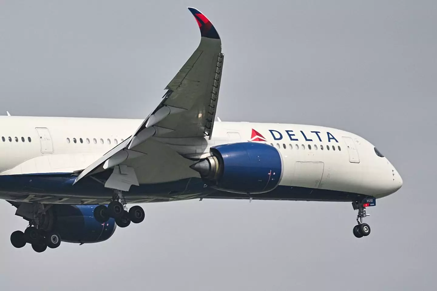 Delta Air Lines states they ensure to update customers 'every 30 minutes' in the event of a long tarmac delay. (HECTOR RETAMAL / Contributor/ Getty)