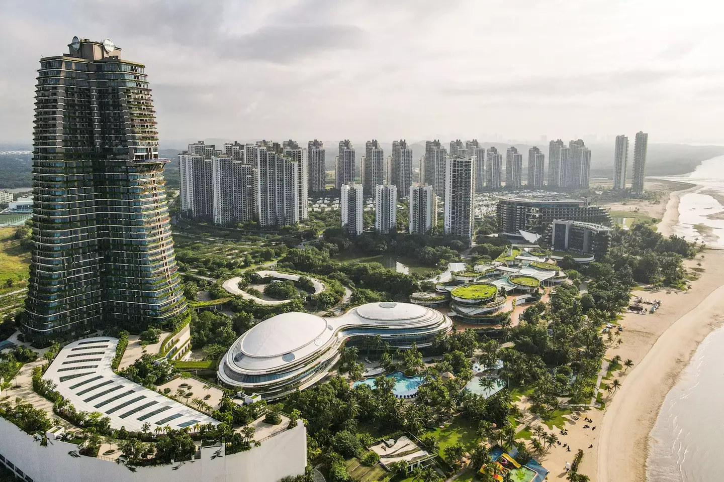 This aerial photo taken on June 16, 2022 shows a general view of Carnelian Tower (L) and condominiums at Forest City.
