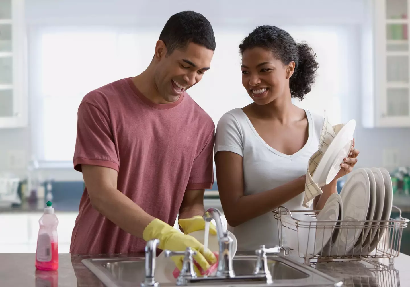 According to experts, washing the dishes together can keep relationships happy (Jose Luis Pelaez Inc/Getty Images)