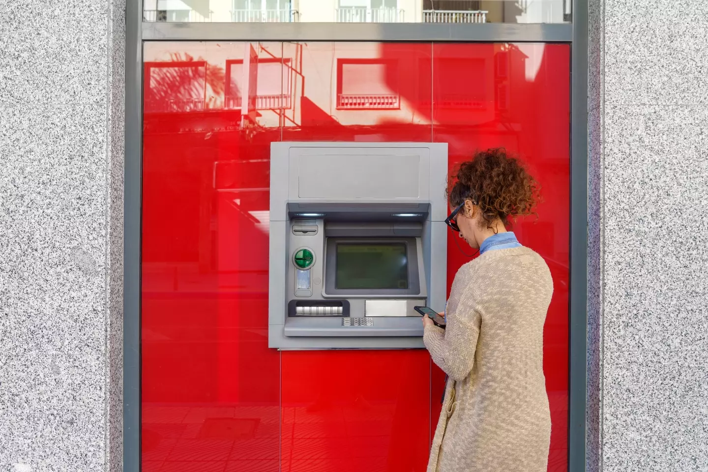 With many banks closing their branches, customers have no choice but to turn to banking on their phone (Javier Zayas Photography/Getty)