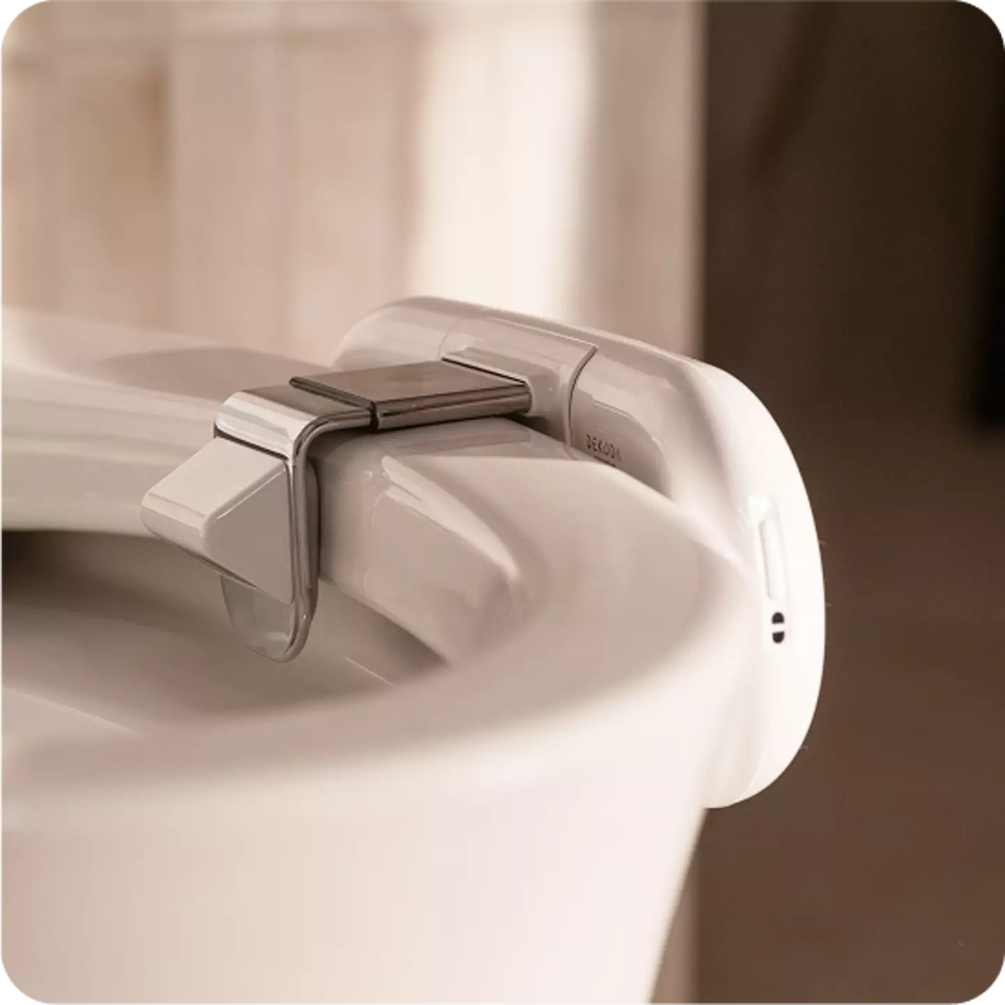 The devices clamps over the toilet rim. (Kohler Health)