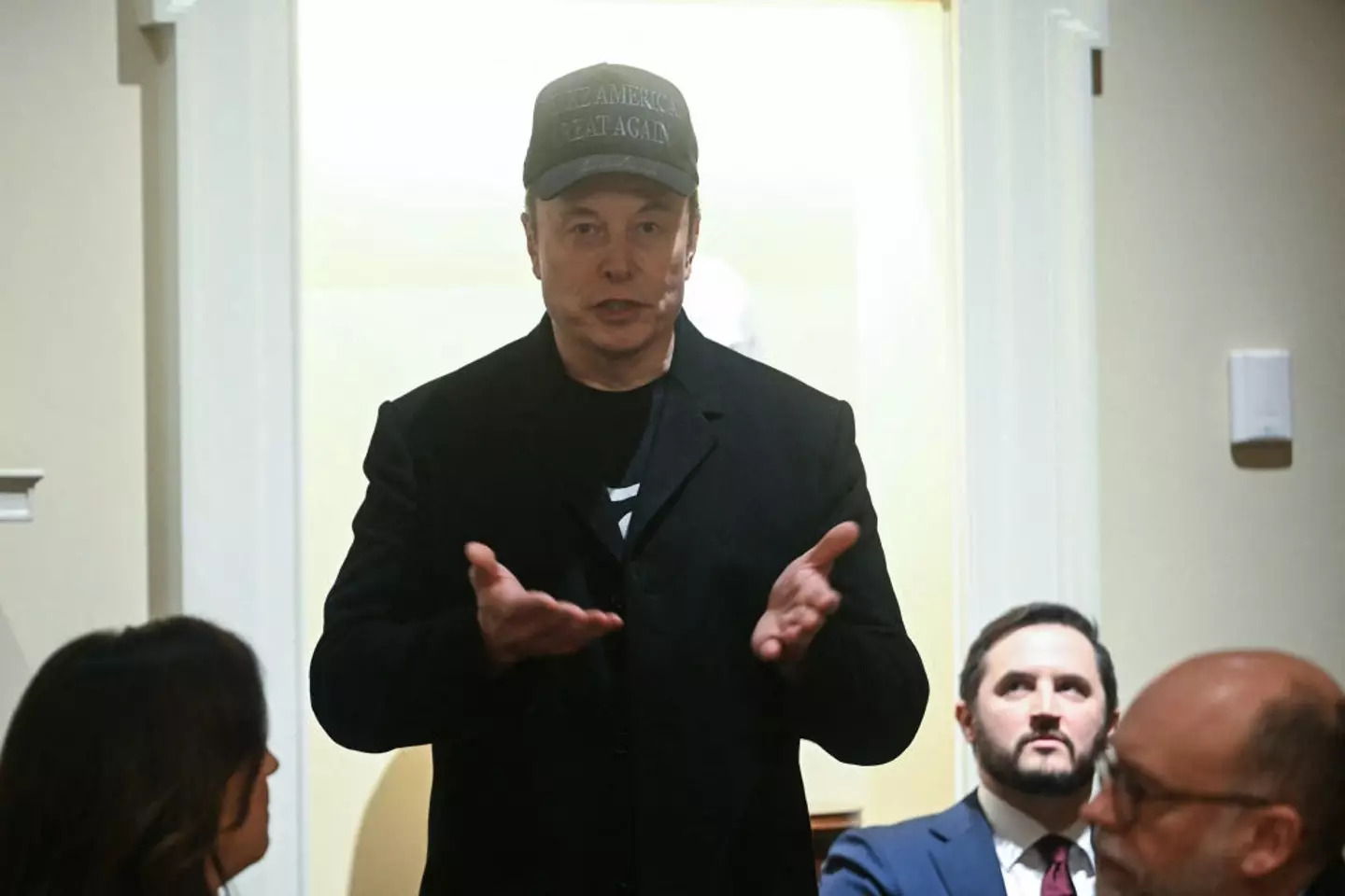 Elon Musk is in a public spat with Trump's trade advisor (JIM WATSON/AFP via Getty Images)