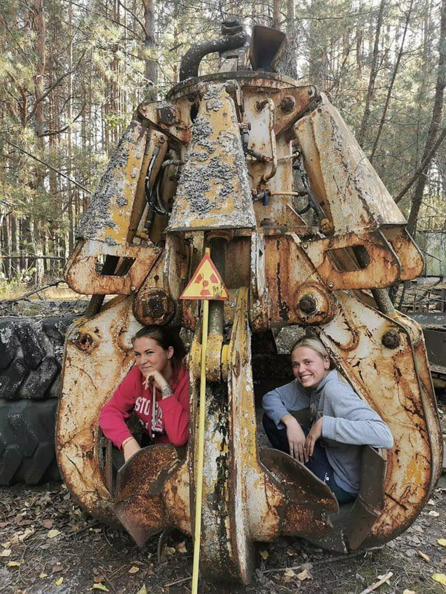 A pair of tourists made contact with a radioactive claw for a photo opportunity. (Reddit)