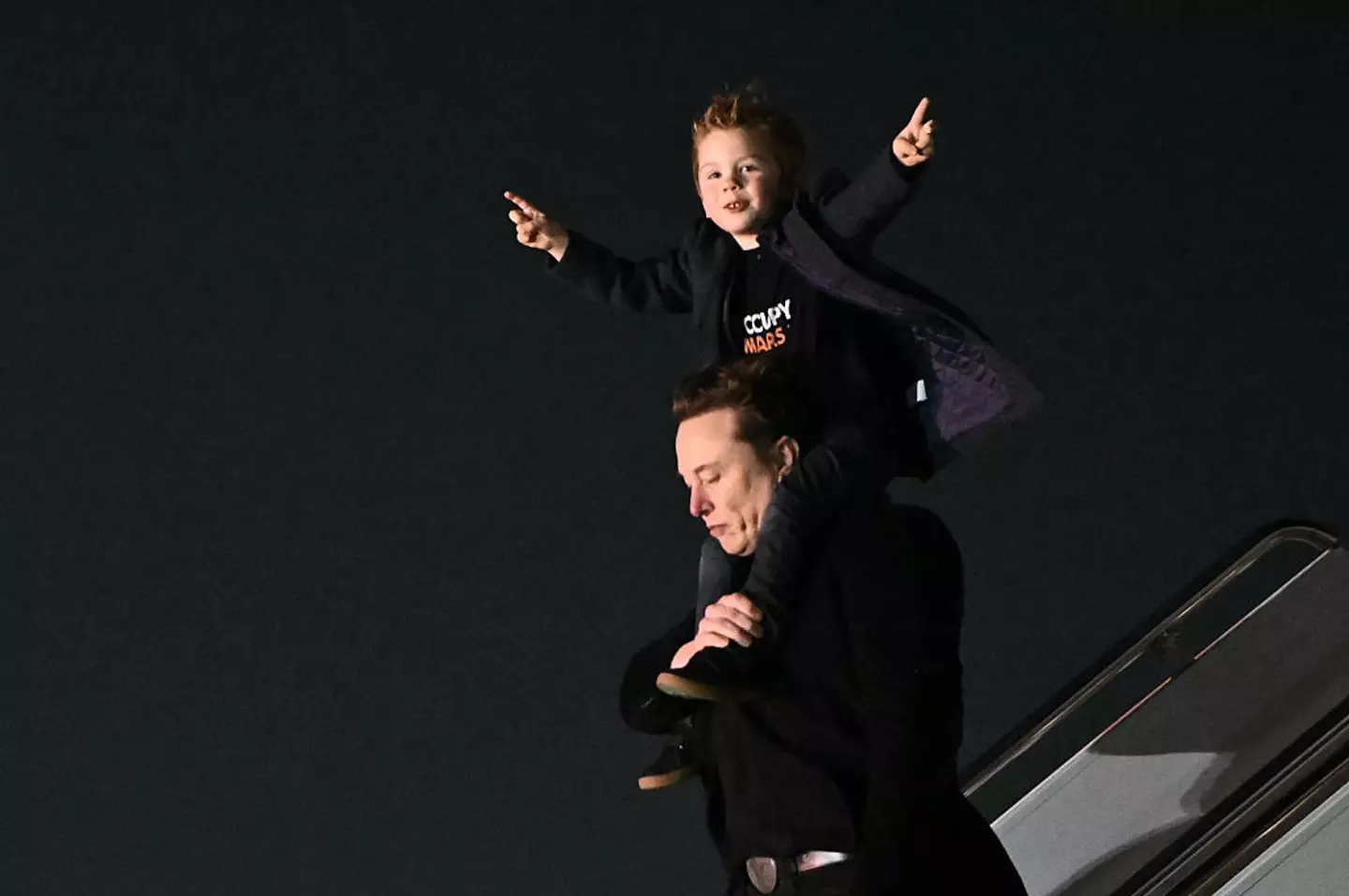 Elon Musk is often seen with his son, X Æ A-12, one of his 14 children (Mandel Ngan/AFP via Getty Images)