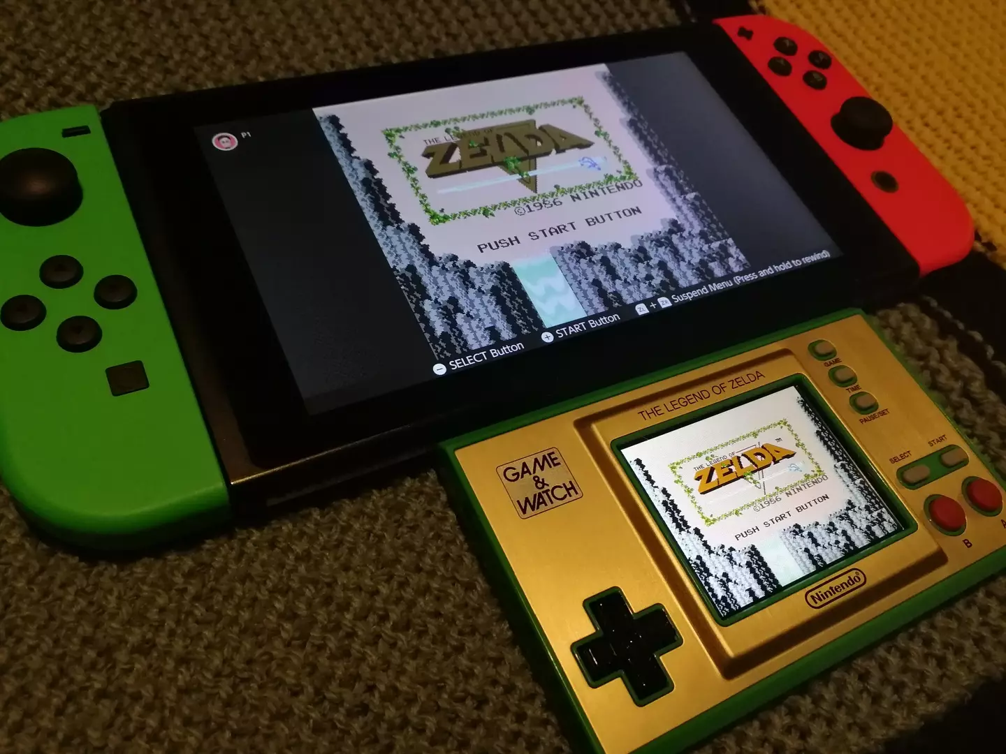 Game & Watch: The Legend of Zelda beside a Nintendo Switch /