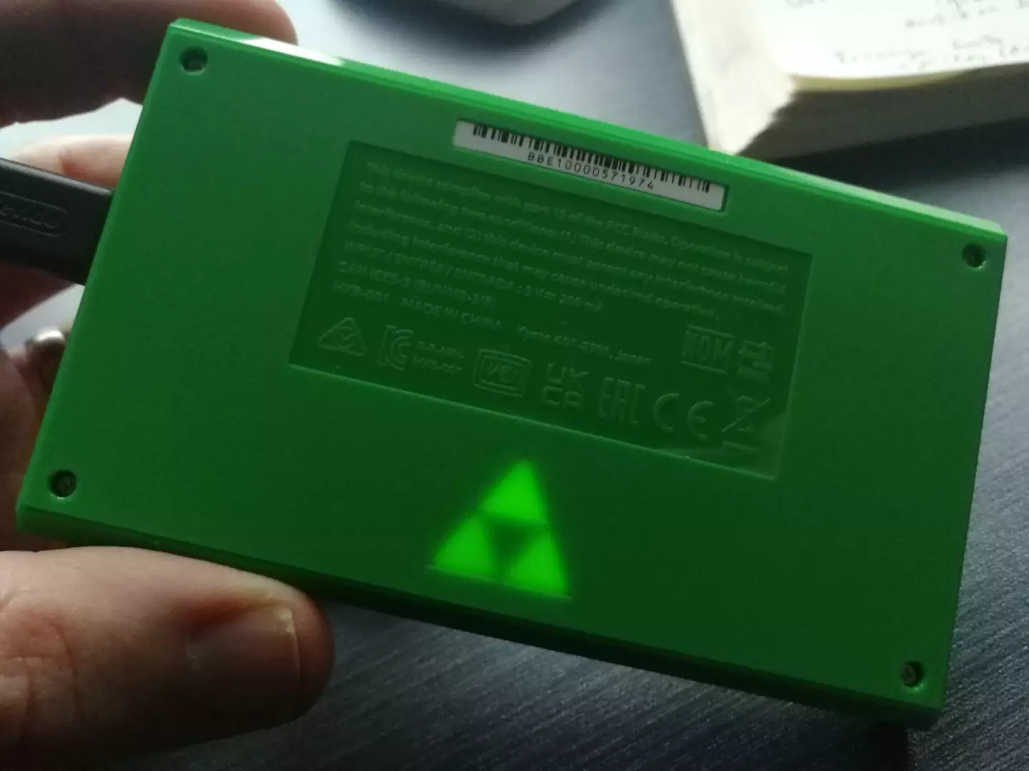 The rear features a glowing Triforce /
