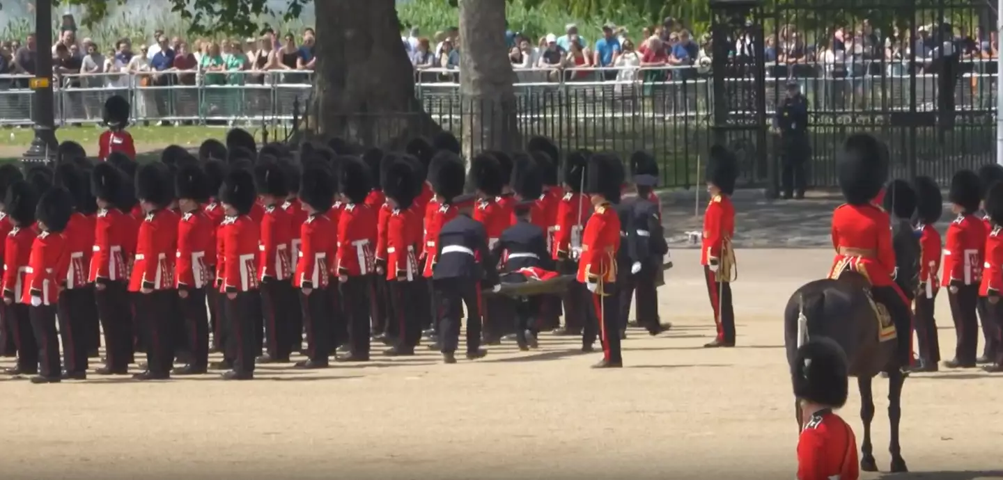 The soldier was carried away on a stretcher.