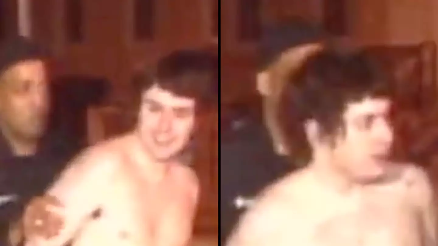 Chilling story behind man who was pictured smiling topless from the back seat of a police car
