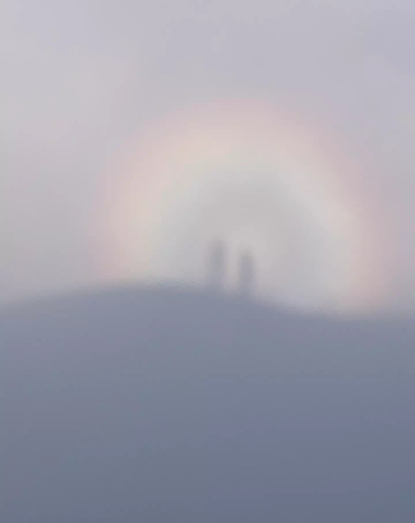 Another recent sighting of Brocken spectres - this time, framed by a rainbow.