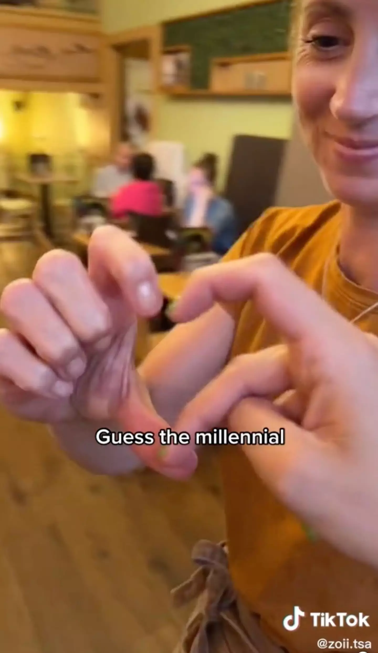 The Millennial has a giveaway sign.